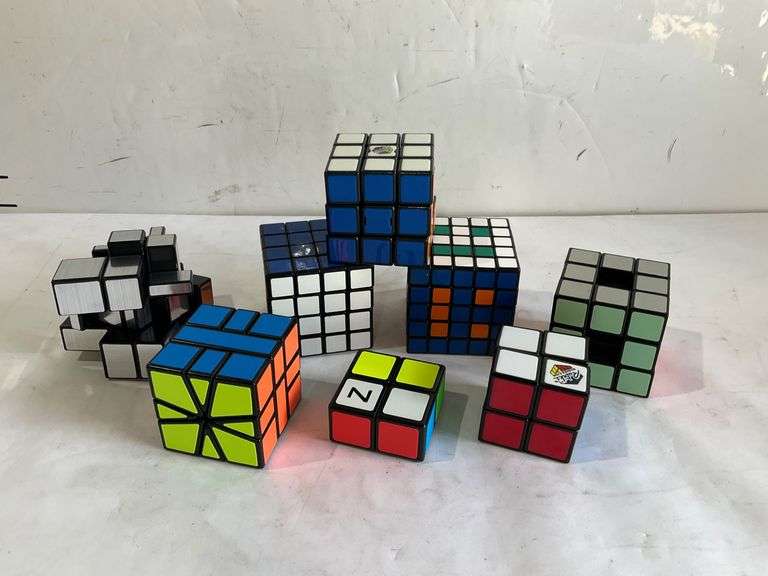 8 Assorted Puzzle and Rubik’s-style Cubes - Hash Auctions