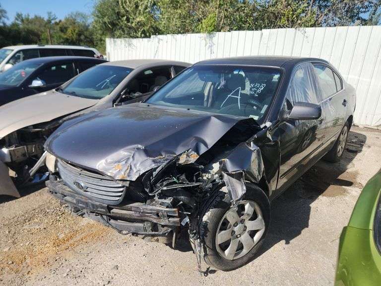2007  KIA  Optima  KNAGE123X75125675