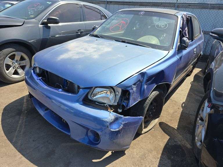 2002  HYUNDAI  Accent  KMHCF35G02U203383