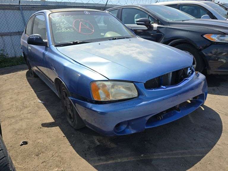 2002  HYUNDAI  Accent  KMHCF35G02U203383