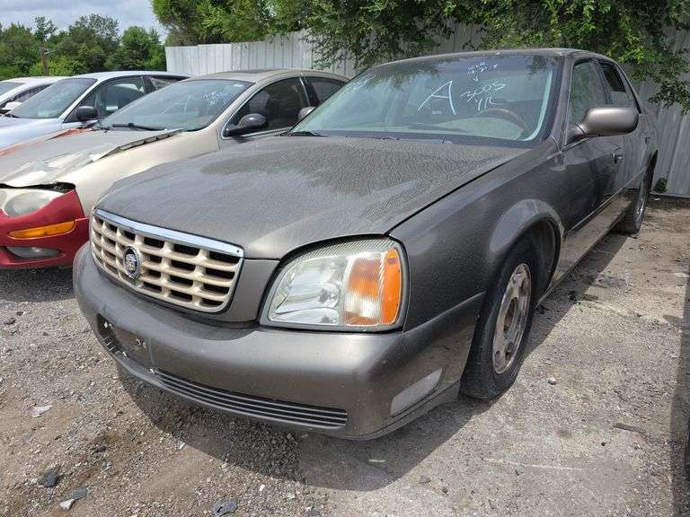 2000  CADILLAC  Deville  1G6KE57Y3YU243005