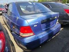 2002  HYUNDAI  Accent  KMHCF35G02U203383
