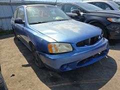 2002  HYUNDAI  Accent  KMHCF35G02U203383