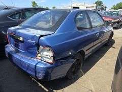 2002  HYUNDAI  Accent  KMHCF35G02U203383