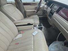 2003  LINCOLN  Town Car  1LNHM82W63Y653697
