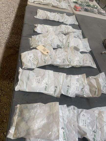 Atkore: 23 pkg. P115EG, 10 pkg. P1114 EG Clamps, Machine Parts