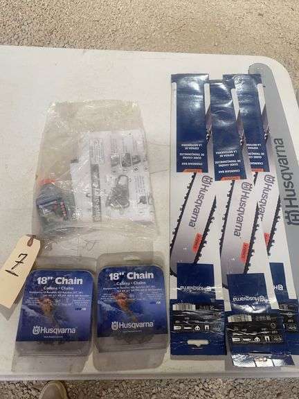 3 Husqvarna 18 inch chainsaw bars, 218 inch chains, one small bottle oil.