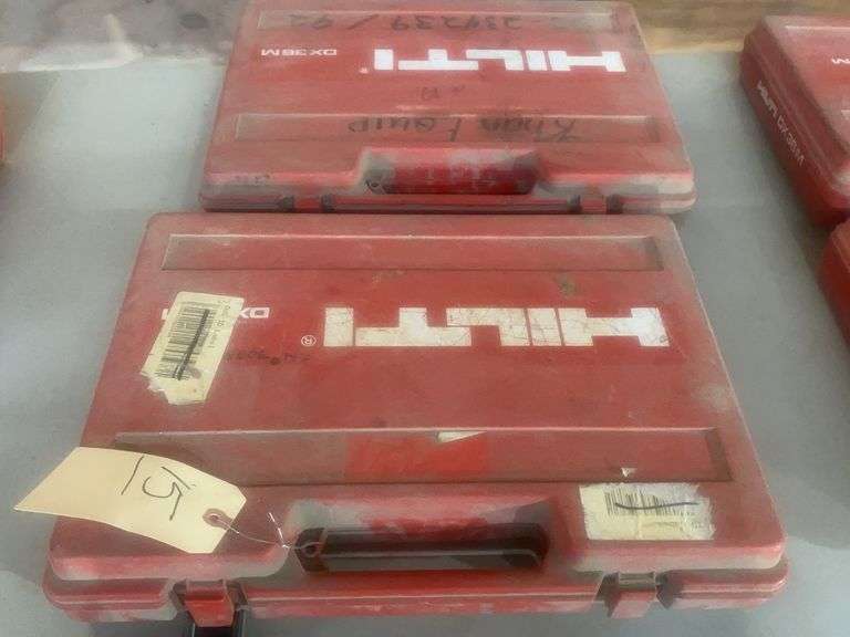 Two Hilti DX36M in cases w/contents