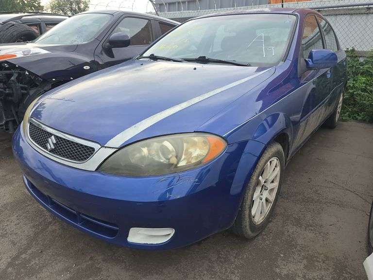 2005  SUZUKI  Reno  KL5JD66Z65K076129