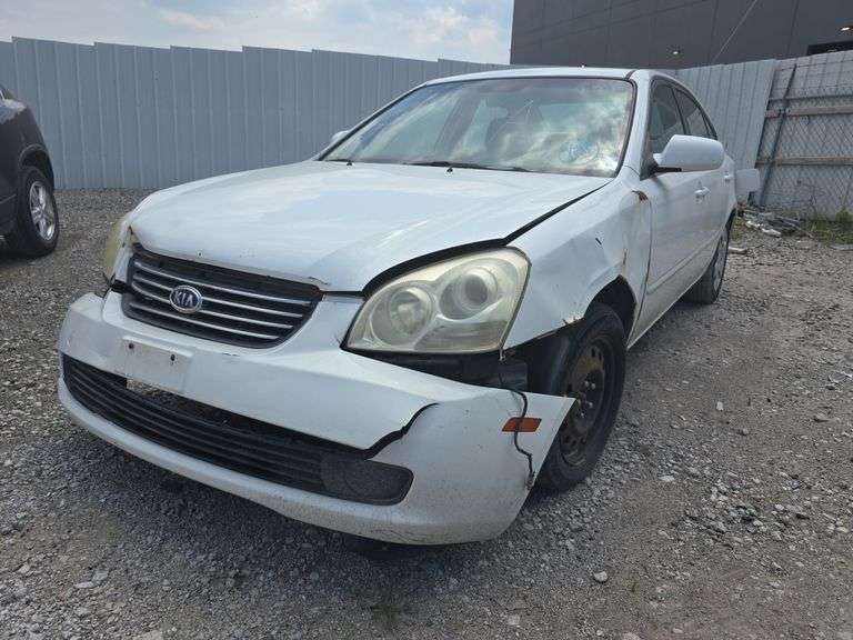 2007  KIA  Optima  KNAGE123375151227