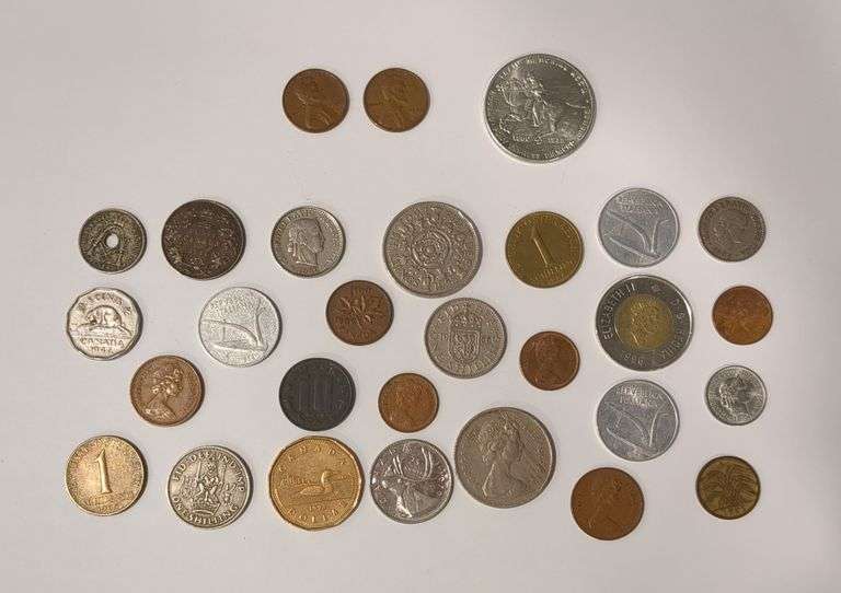 Silver Canadian Coin, 2 Wheat Pennies, Foreign Coins, and a Commemorative Medallion
