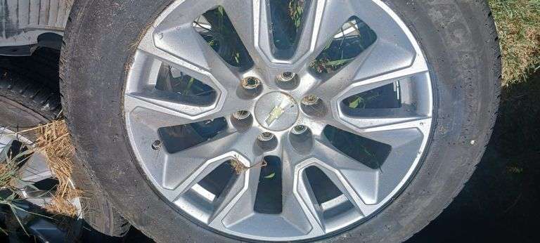(4) 20 INCH CHEVY TIRES AN WHEELS