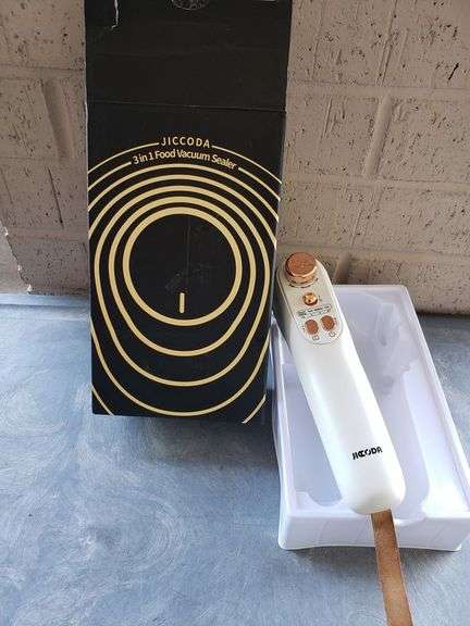 HAND HELD FOOD SEALER