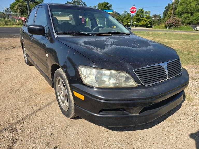 2002 MITSUBISHI LANCER VIN# JA3AJ86E32U064966 HAS KEY HAS TITLE RUNS AN DRIVES HAS COLD AC AT TIME OF PICTURES