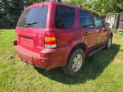 2006 FORD ESCAPE VIN# 1FMYU4116KA37805 HAS KEY HAS TITLE RUNS AN DRIVES HAS COLD AC AT TIME OF PICTURES