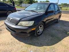 2002 MITSUBISHI LANCER VIN# JA3AJ86E32U064966 HAS KEY HAS TITLE RUNS AN DRIVES HAS COLD AC AT TIME OF PICTURES