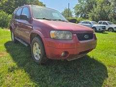 2006 FORD ESCAPE VIN# 1FMYU4116KA37805 HAS KEY HAS TITLE RUNS AN DRIVES HAS COLD AC AT TIME OF PICTURES
