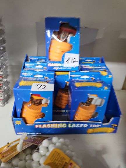 FLASHING LASER TOP SOUND AND LIGHT SHOW TOY