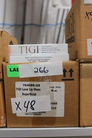 TIGI COSMETICS 764089 LUXE LIP GLOSS IN SUPERFICIAL COLOR .11OZ