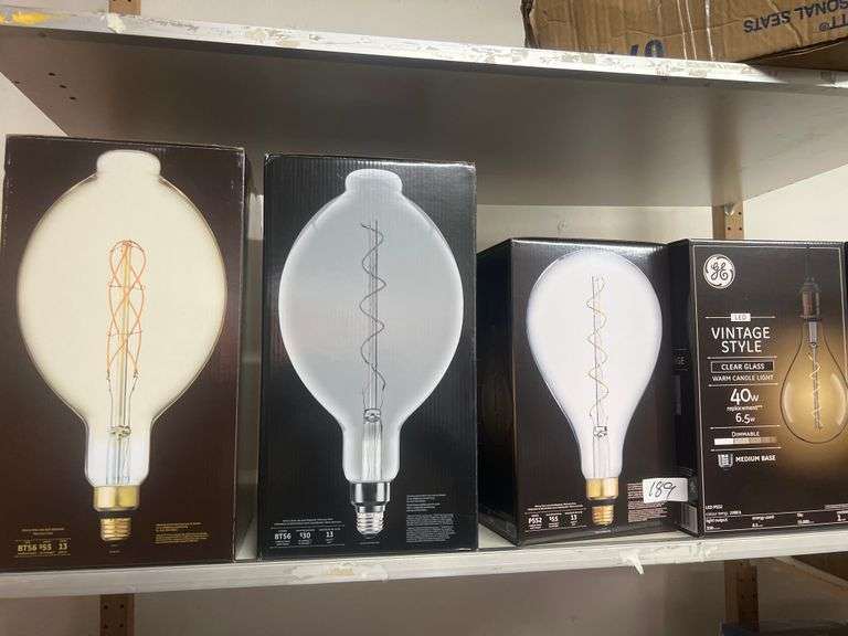 GE VINTAGE STYLE 6.5W DIMMABLE MEDIUM BASE LED LARGE BULBS INCLUDING SMOKE FINISH COOL MODERN LIGHT ; AND AMBER GLASS WARM CANDLE LIGHT