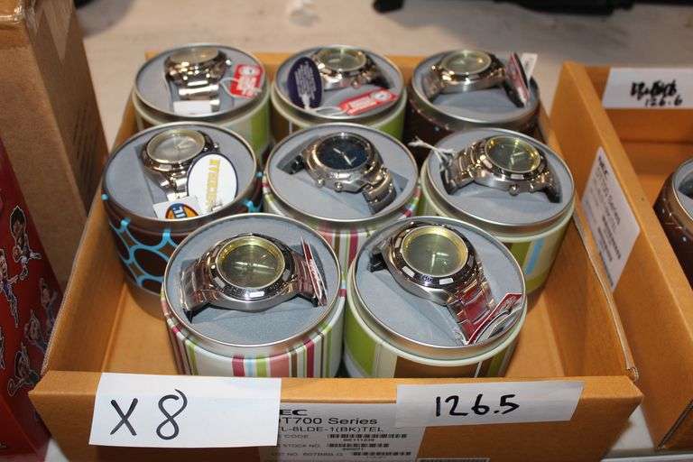 Assorted Fossil Collegiate Licensed Watches featuring teams such as Michigan and various others