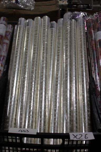assorted brand new wrapping paper, 30" x 100" clear printed roll