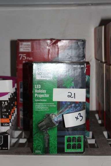 Lot of assorted Home Accents Holiday items including Home Accents Holidau LED Holiday Projector, Home Accents Holiday 300 Clear Incandescent Mini Lights, 75- Pack All-Purpose Light Clips