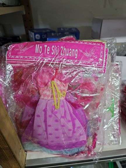 MO TE SHI ZHUANG MEILIDE DOLL DRESS IN VARIOUS DESIGNS APROX 12 PER PACK
