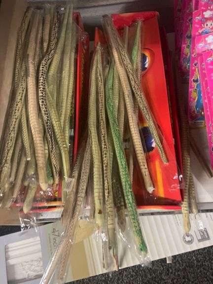 LIFE-LIKE WOODEN SNAKE TOY APROX 1.5'