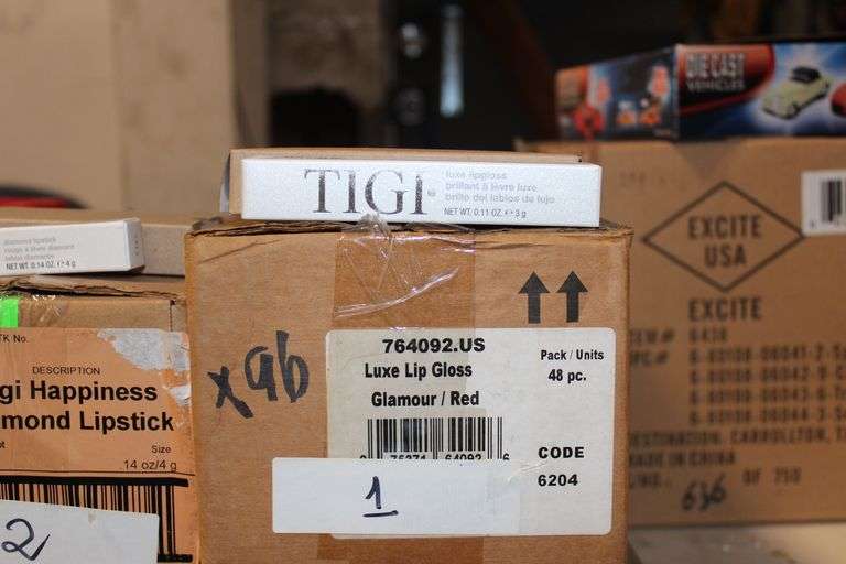 Tigi Cosmetics 764092 Luxe Lip Gloss In Glamour Red Color .11Fl Oz