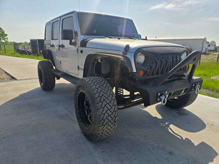 2010 JEEP WRANGLER VIN# 1J4BA5H18AL105895 HAS KEY HAS REBUILT TITLE 5SPEED 4X4 CUSTOM WHEELS WITH 90