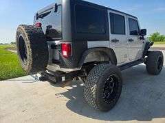 2010 JEEP WRANGLER VIN# 1J4BA5H18AL105895 HAS KEY HAS REBUILT TITLE 5SPEED 4X4 CUSTOM WHEELS WITH 90