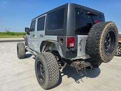 2010 JEEP WRANGLER VIN# 1J4BA5H18AL105895 HAS KEY HAS REBUILT TITLE 5SPEED 4X4 CUSTOM WHEELS WITH 90