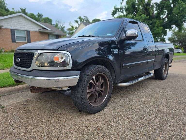 2002 FORD F150 VIN# 1FTRX17W72NA60303 HAS KEY HAS TITLE RUNS AN DRIVES SEE DESCRIPTION