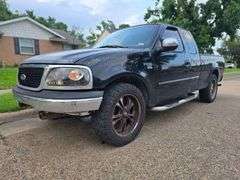 2002 FORD F150 VIN# 1FTRX17W72NA60303 HAS KEY HAS TITLE RUNS AN DRIVES SEE DESCRIPTION