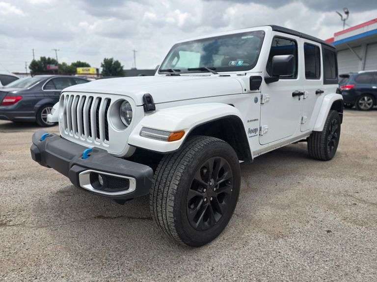 10% BUYERS PREMIUM 2023 JEEP WRANGLER SAHARA VIN# 1C4JJXP64PW698821 HAS KEY HAS TITLE RUNS AN DRIVES SEE DESCRIPTION