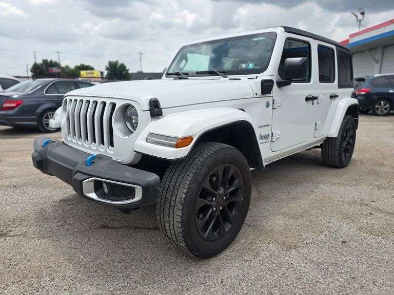 10% BUYERS PREMIUM 2023 JEEP WRANGLER SAHARA VIN# 1C4JJXP64PW698821 HAS KEY HAS TITLE RUNS AN DRIVES SEE DESCRIPTION