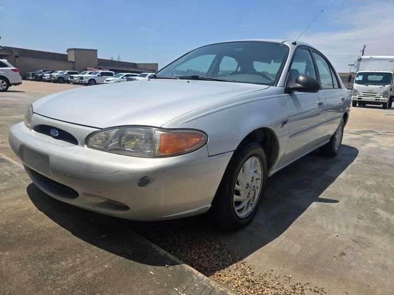 1997 FORD ESCORT VIN# 1FALP13P8VW307675 HAS KEY HAS TITLE RUNS AN DRIVES SEE DESCRIPTION