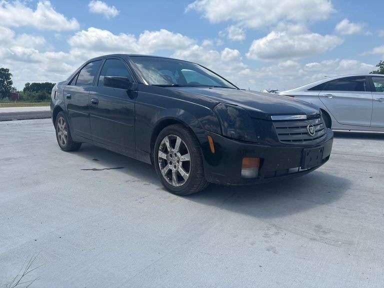 2003 CADILLAC CTS VIN# 1G6DM57N430132464 HAS KEY HAS TITLE RUNS AN DRIVES SEE DESCRIPTION