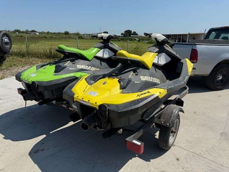 (2) SEADOOS AN TRAILER HAS KEYS HAS TITLES RUNS AN DRIVES SEE DESCRIPTION