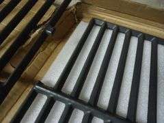 NEW! 2-PACK OF GRILL GRATES. ONE BAR BROKEN OFF