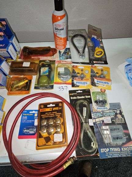 AUTOMOTIVE REPLACEMENT PARTS AND HARDWARE ALL NEW INCLUDING PHILIPS HEADLIGHT BULBS, 18" REINFORCED GREASE HOSE, SELF LOCKING TIE-DOWN SYSTEM ECT