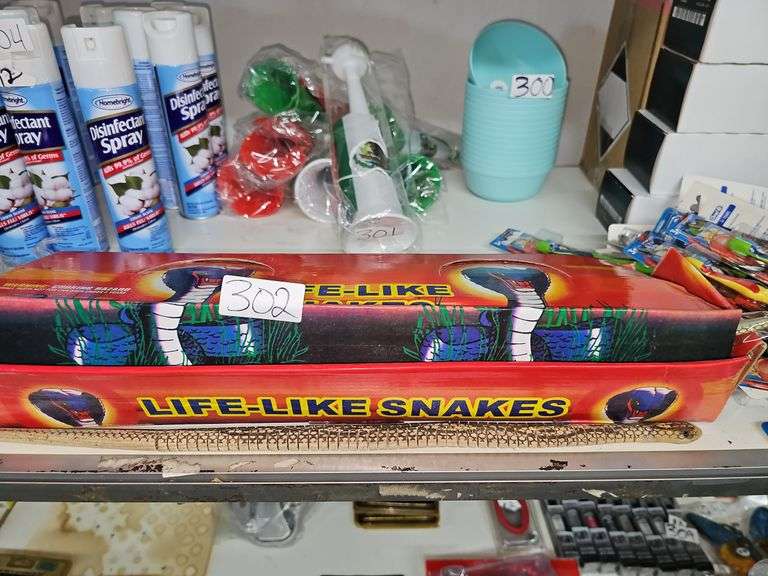 LIFE-LIKE WOODEN SNAKE TOY APROX 1.5'