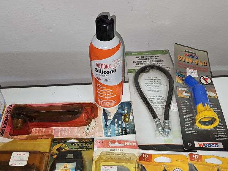 AUTOMOTIVE REPLACEMENT PARTS AND HARDWARE ALL NEW INCLUDING PHILIPS HEADLIGHT BULBS, 18" REINFORCED GREASE HOSE, SELF LOCKING TIE-DOWN SYSTEM ECT