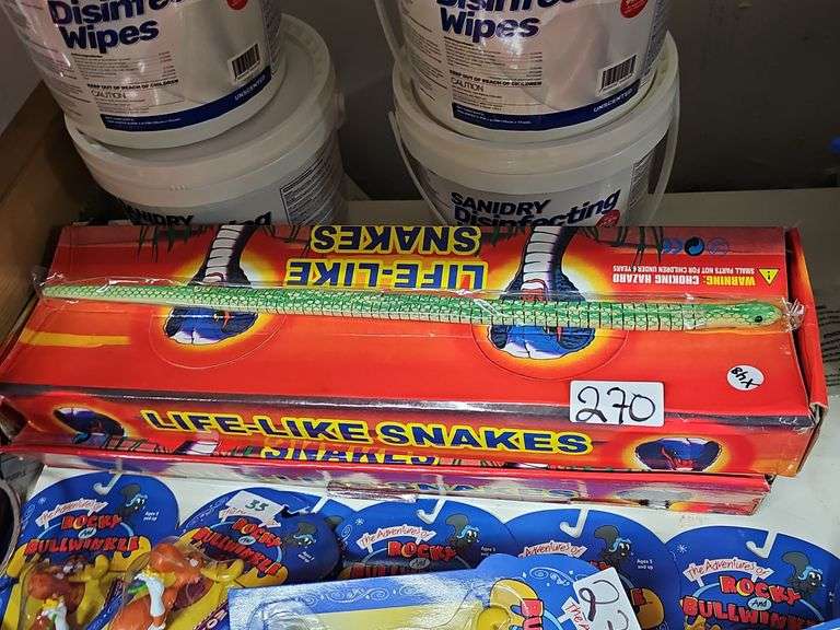 LIFE-LIKE WOODEN SNAKE TOY APROX 1.5'