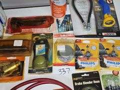 AUTOMOTIVE REPLACEMENT PARTS AND HARDWARE ALL NEW INCLUDING PHILIPS HEADLIGHT BULBS, 18" REINFORCED GREASE HOSE, SELF LOCKING TIE-DOWN SYSTEM ECT