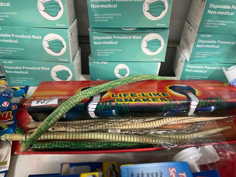 LIFE-LIKE WOODEN SNAKE TOY APROX 1.5'