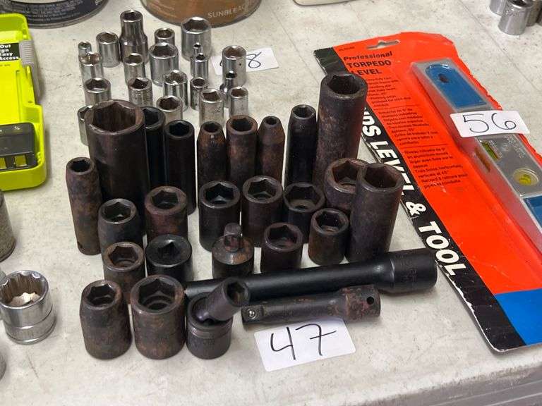 METRIC AND STANDARD IMPACTED SOCKETS WITH VARIOUS DRIVE SIZES BRANDS INCLUDE MOSTLY CRAFTSMAN