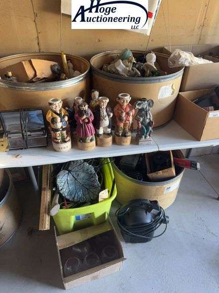 Decanters, Avon bottles, yardsticks contents of top & under table