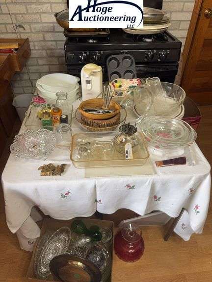 Glassware, Nutcracker, cookie sheets, all contents top a table, under table and top of stove